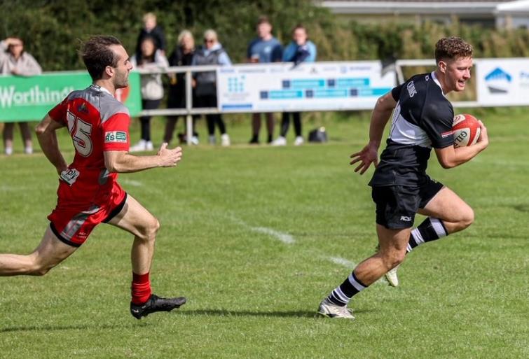 Morgan Rogers grabs an interception try for The Quins (Steve Howells)